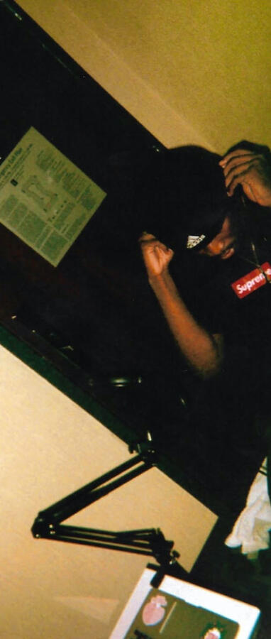 Photo of $tereoDaking in early 20s recording in a hotel by the Hartfield-Jackson airport